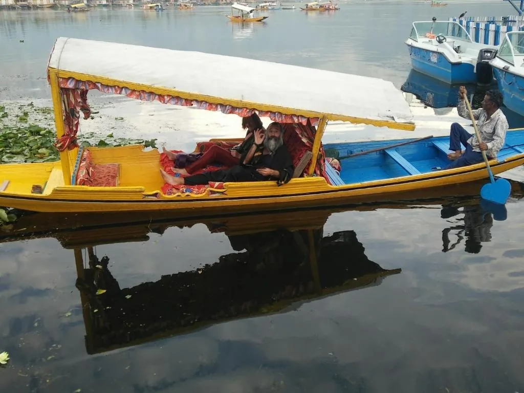 Traditional shikara boat with canopy on Dal Lake